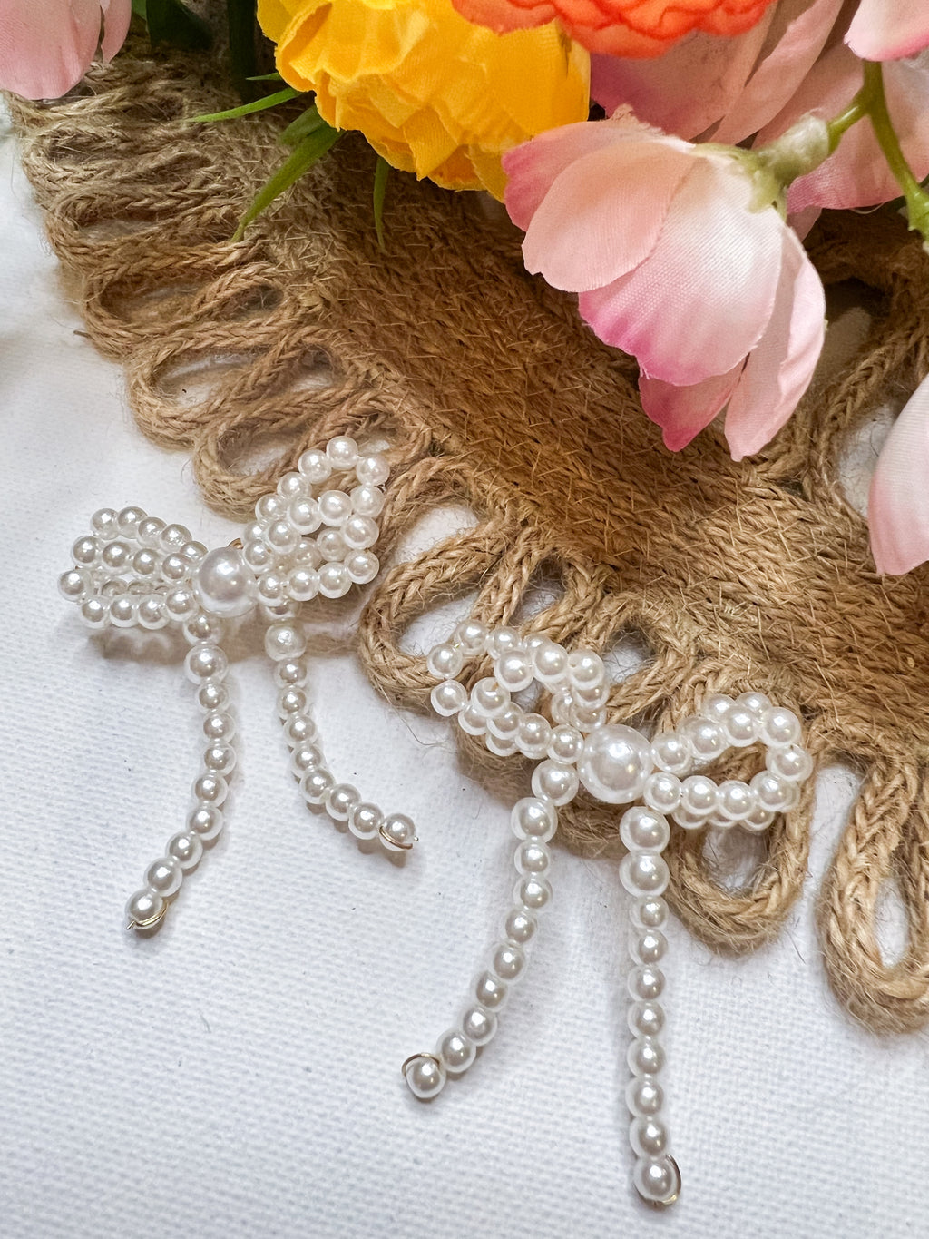 Enchanted Elegance Pearl Bow Earrings
